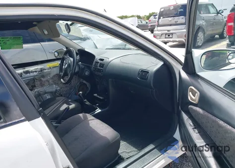 2001 Toyota Corolla S from USA, damaged, VIN 1NXBR12E01Z550575